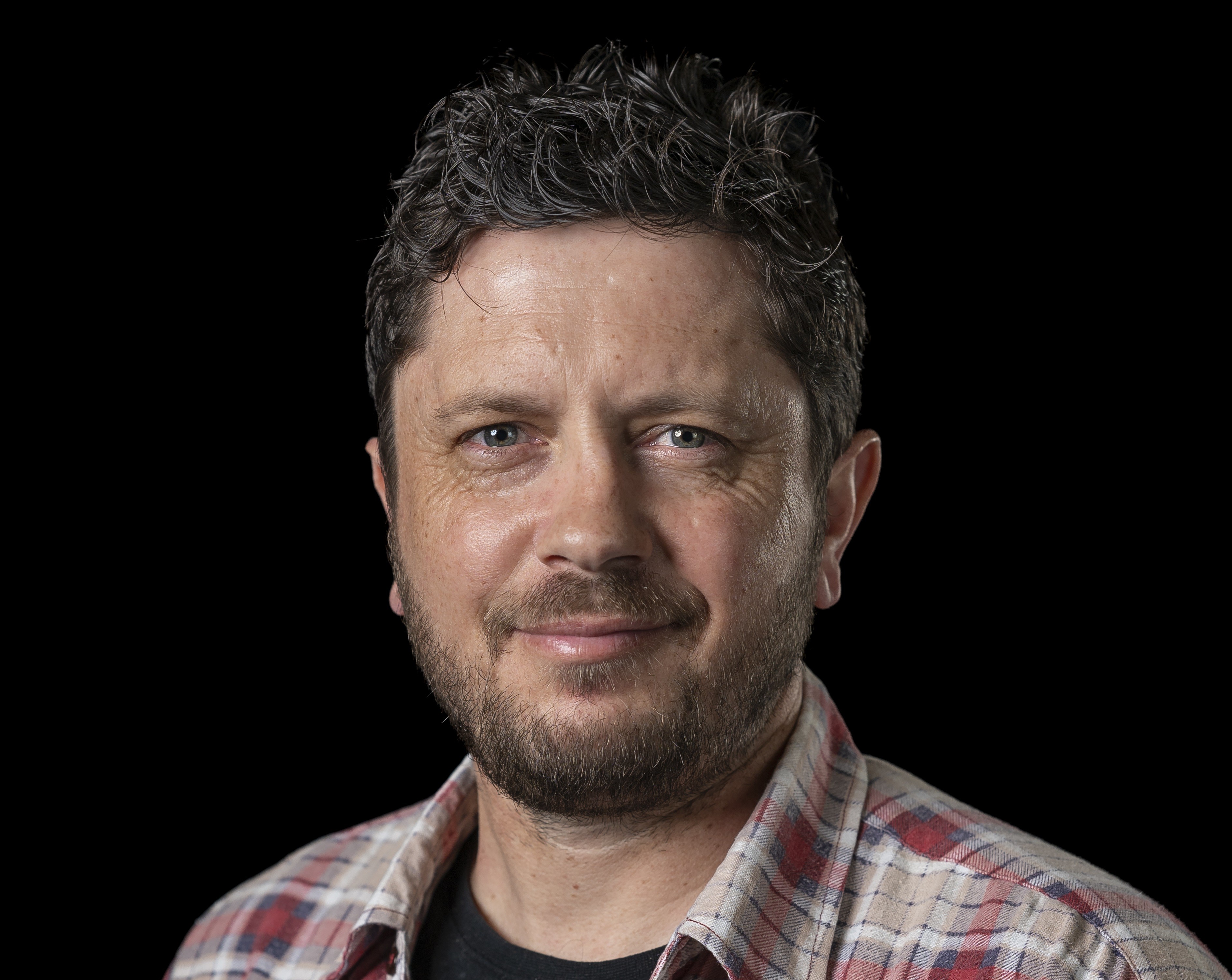 A headshot of Nathan Maynard.