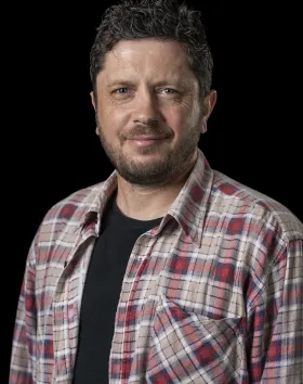 A headshot of Nathan Maynard.