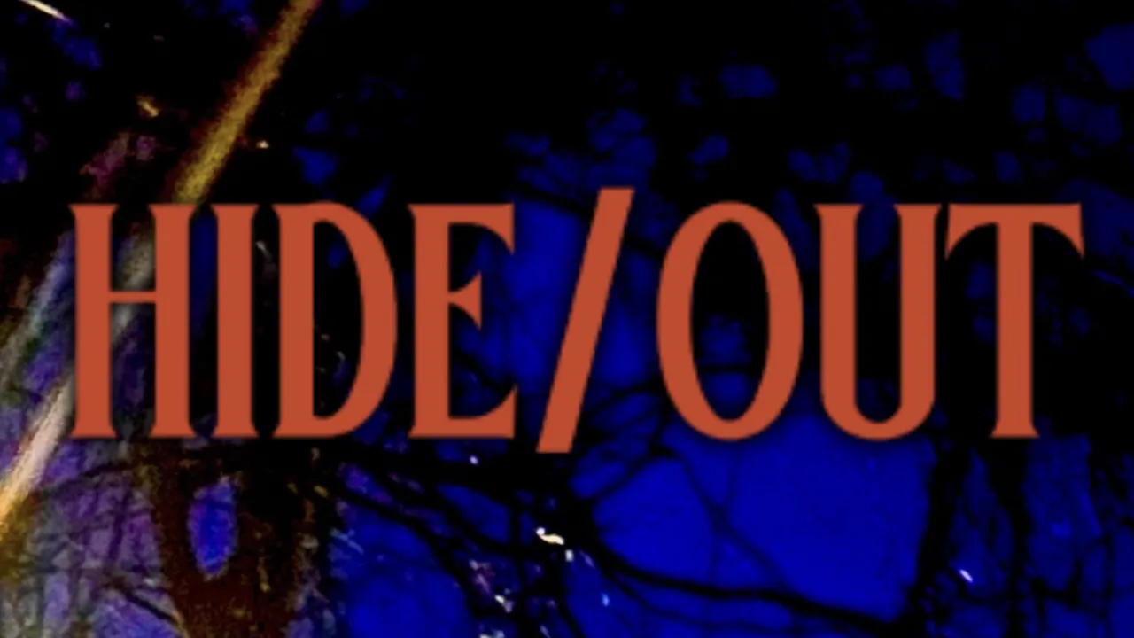 Image of 'HIDE/OUT' text in bright red capital letters against a dark textural background.