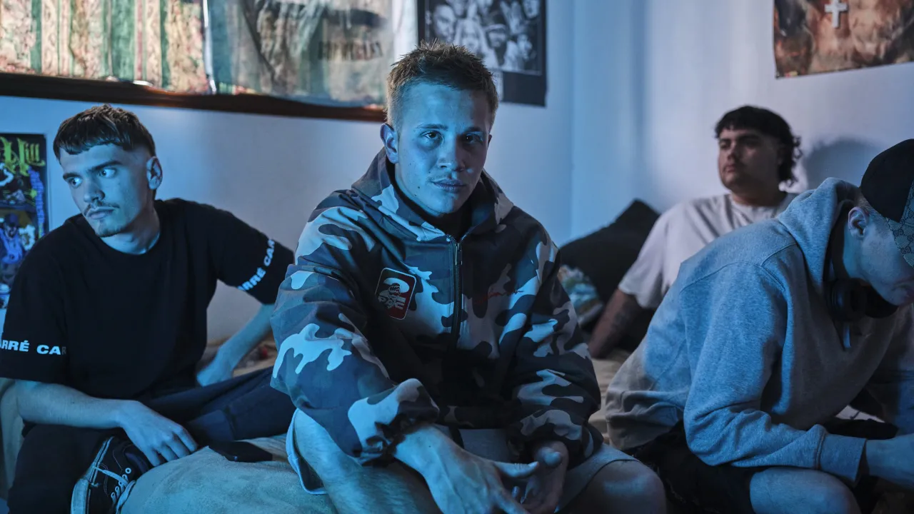 Group of young men in a bedroom in the outer suburbs of Perth, shot on site during GRID Series Outer Perth 2025