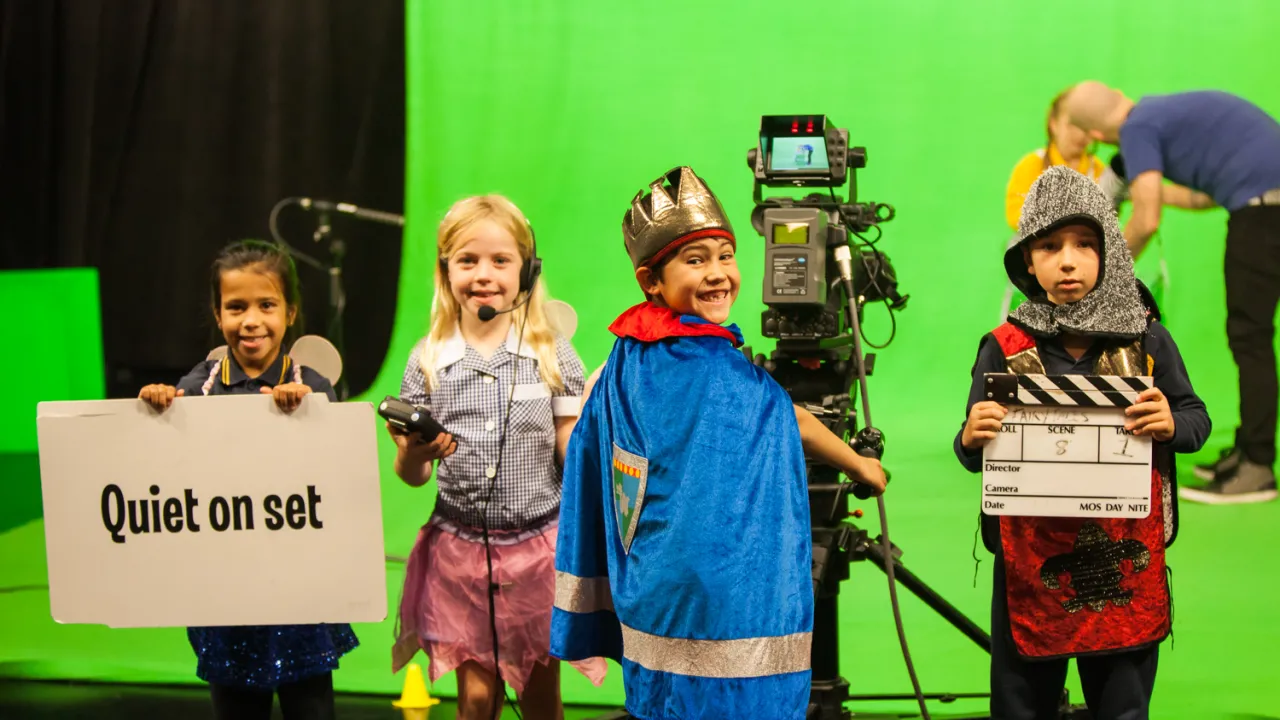 A group of primary school children directing and acting in a film
