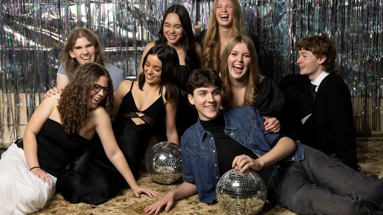 2026 graduate musicians laughing with disco ball