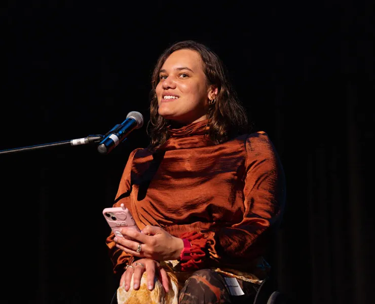 Riana Head-Toussaint onstage at the 2024 Creative Australia and National Arts and Disability Awards