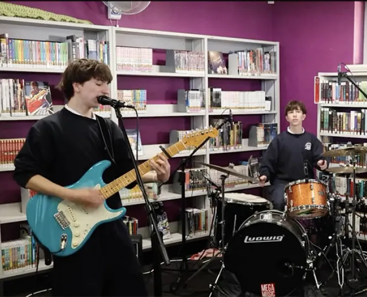 Band playing in a high school library