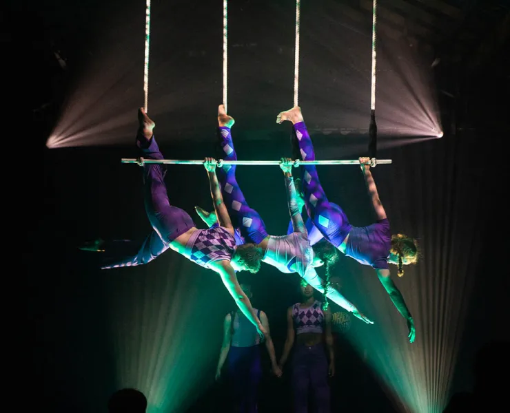 Acrobats performing onstage